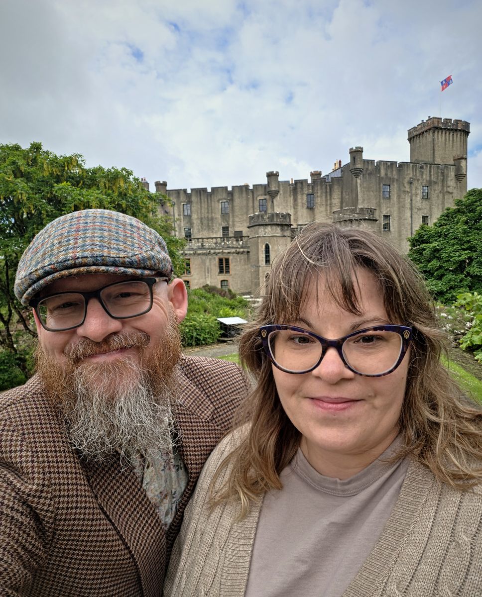 Carlton and Ashley in front of a castle